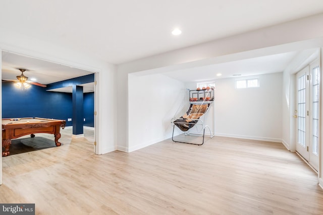 recreation room with ceiling fan, light wood-type flooring, and billiards