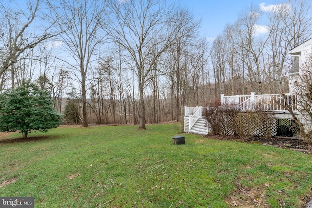 view of yard with a deck