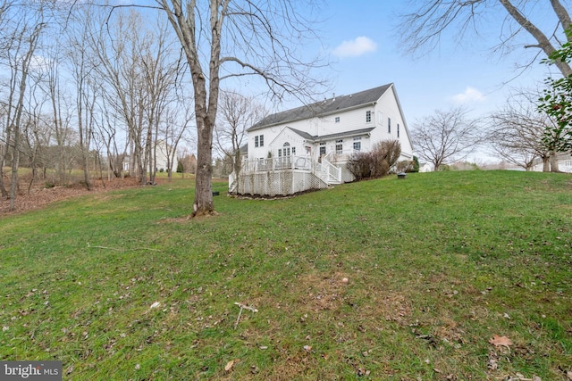 view of yard with a deck