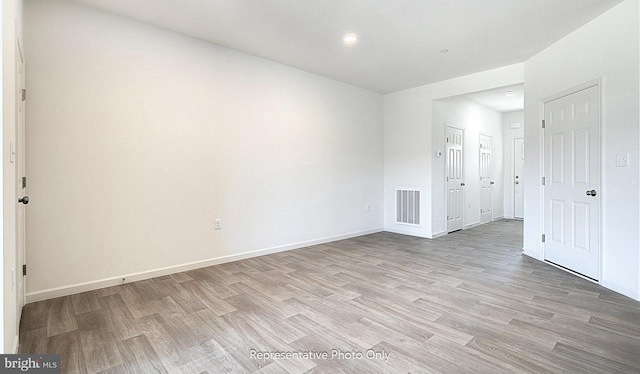 empty room featuring light hardwood / wood-style floors