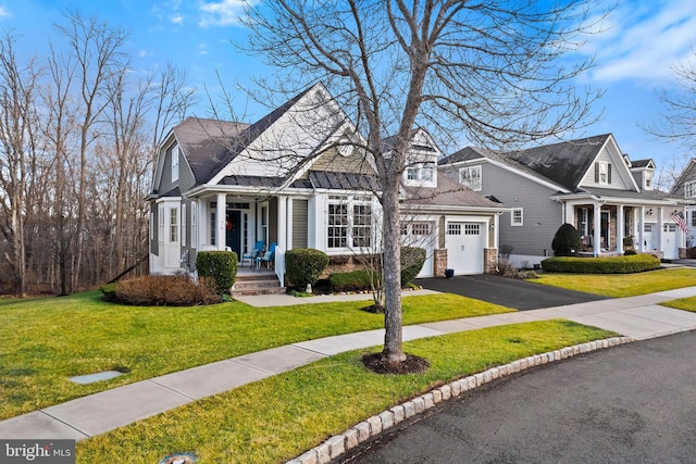 76 Bedford Dr, Skillman, NJ 08558 - view of front of property with a porch, asphalt driveway, a front yard, and a garage