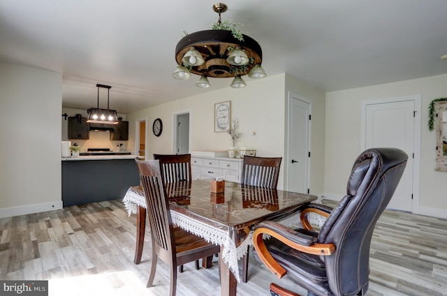 dining room featuring light hardwood / wood-style flooring