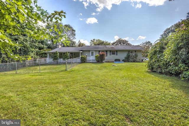 view of front of home with a front yard