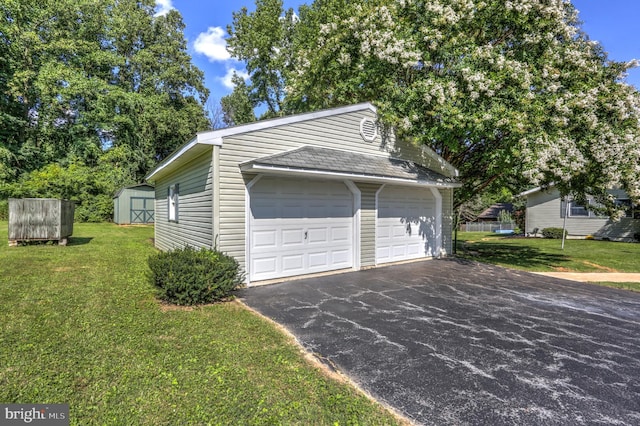 garage with a lawn