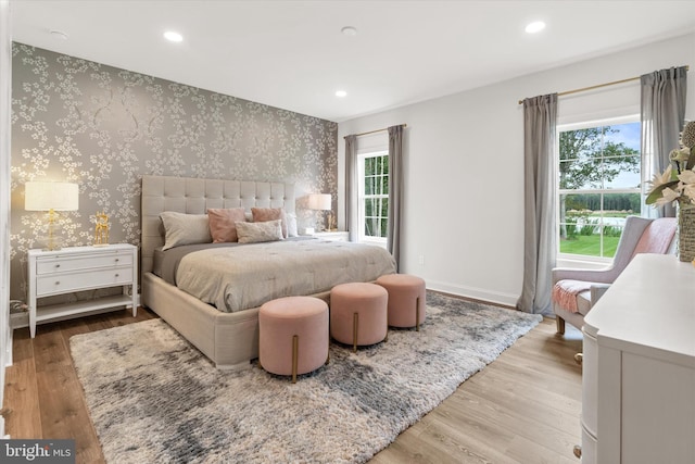 bedroom with light hardwood / wood-style flooring