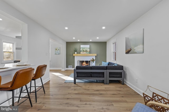 living room with light hardwood / wood-style floors