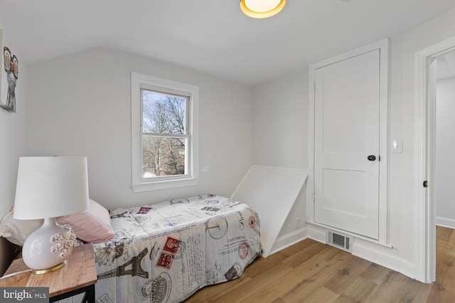 bedroom with light hardwood / wood-style flooring