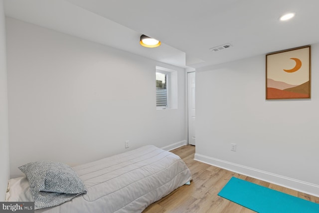 bedroom featuring light hardwood / wood-style floors