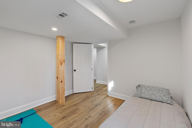 bedroom featuring light hardwood / wood-style floors