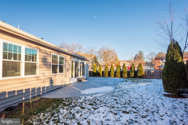 view of yard covered in snow