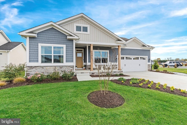 craftsman-style house with a garage and a front lawn