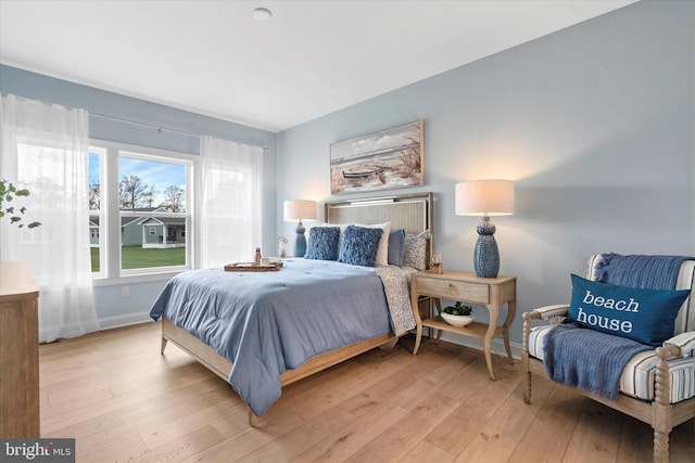 bedroom featuring light wood-type flooring