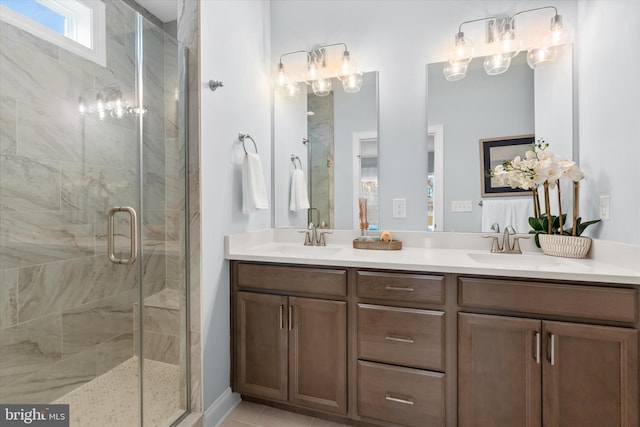 bathroom with vanity, tile patterned floors, and an enclosed shower