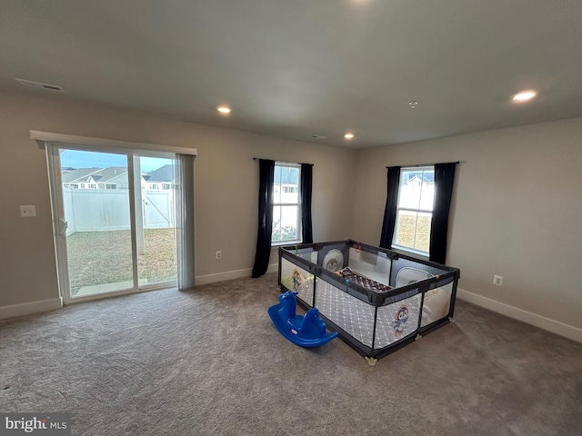 recreation room with carpet floors