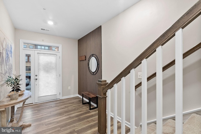 entryway with wood-type flooring