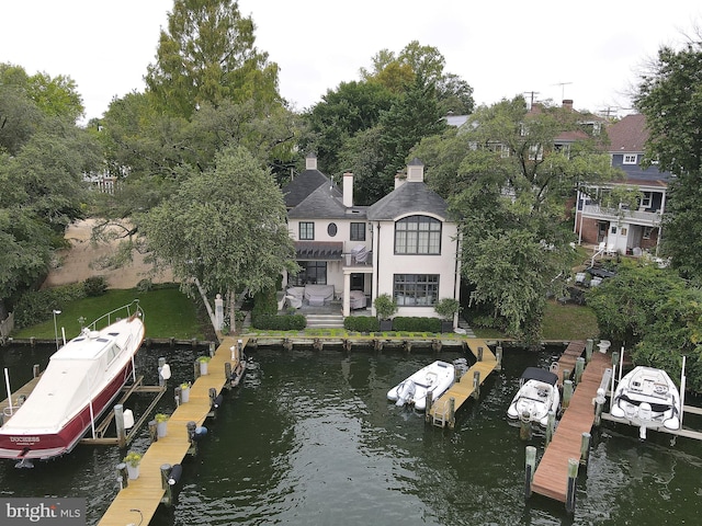 dock area with a water view