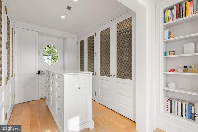 spacious closet featuring light wood-type flooring