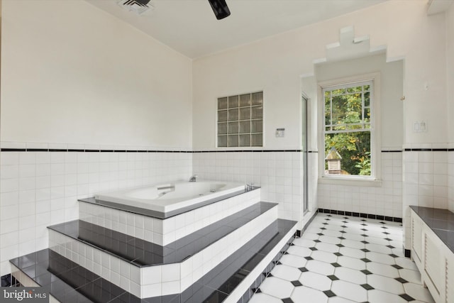 1250 Ashbourne Rd, Elkins Park, PA 19027 - full bath featuring tile walls, a garden tub, a wainscoted wall, tile patterned floors, and a stall shower