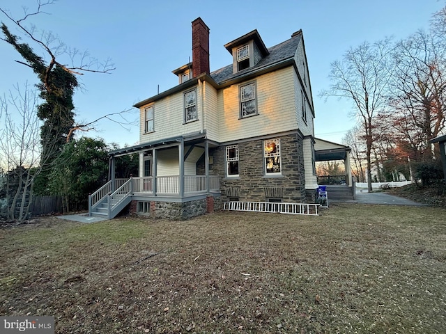1250 Ashbourne Rd, Elkins Park, PA 19027 - rear view of property with a porch and stone siding