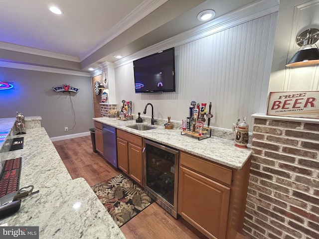 bar featuring light stone countertops, sink, wine cooler, dark hardwood / wood-style floors, and crown molding