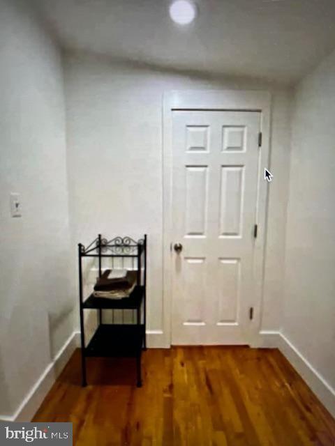 doorway to outside with hardwood / wood-style floors