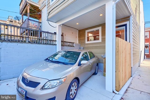 view of side of home featuring a carport