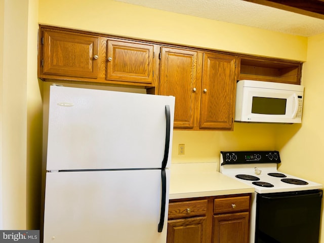 kitchen featuring white appliances