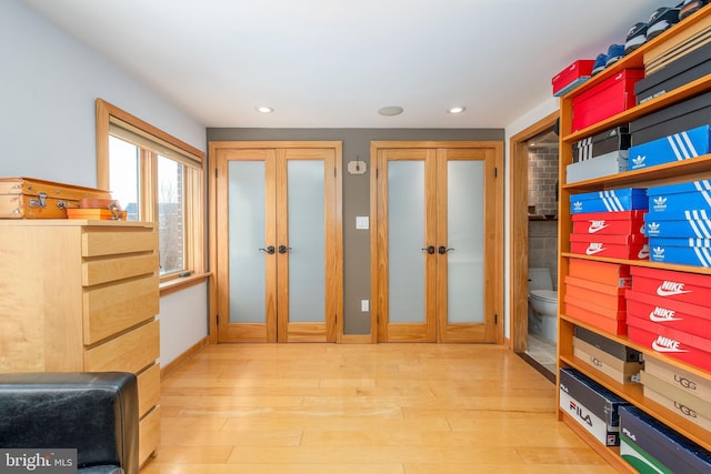 storage featuring french doors