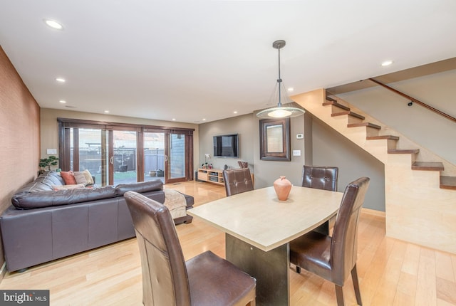 dining space featuring light hardwood / wood-style flooring