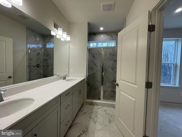 bathroom featuring vanity and walk in shower