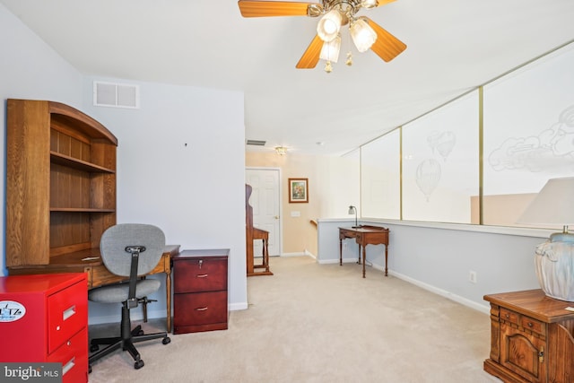 office area featuring ceiling fan and light carpet