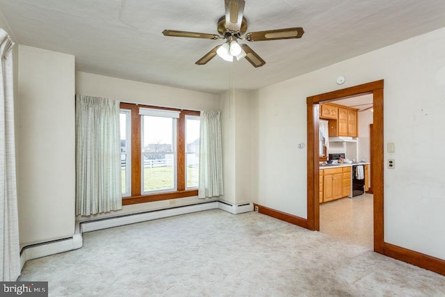 unfurnished room featuring ceiling fan, a baseboard radiator, and a textured ceiling