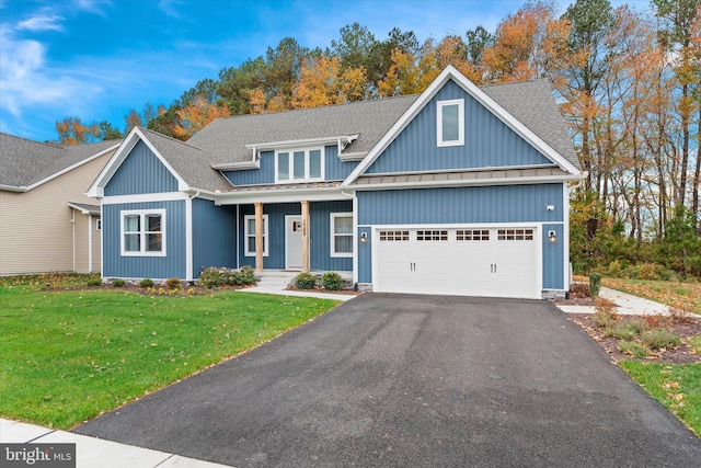 craftsman-style house with a front lawn and a garage