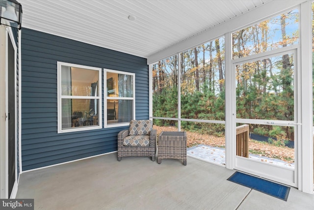 sunroom / solarium featuring a wealth of natural light