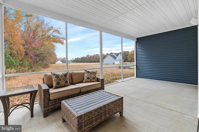 sunroom / solarium with wooden ceiling