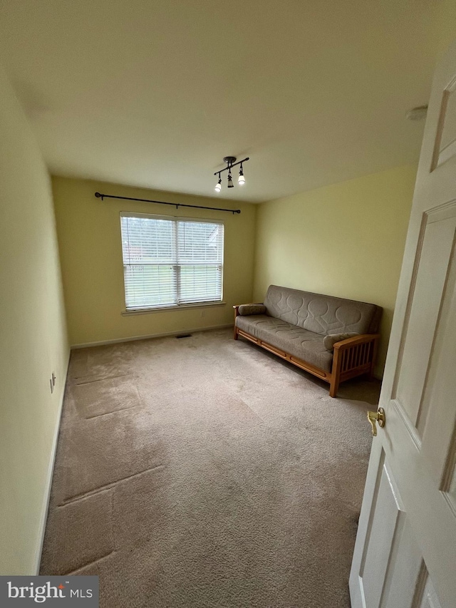 unfurnished room featuring carpet flooring