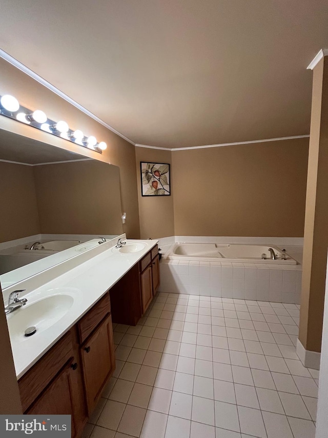 bathroom featuring tile patterned floors, vanity, ornamental molding, and tiled bath