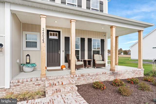 entrance to property featuring a porch