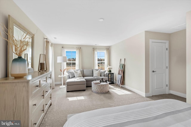 bedroom with light colored carpet