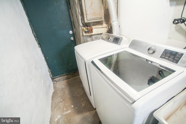 washroom with independent washer and dryer