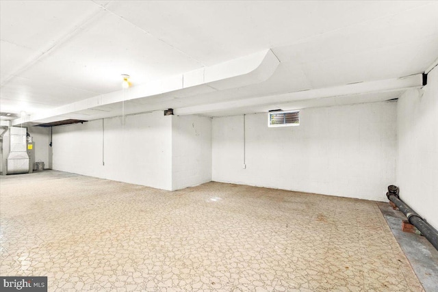 basement featuring heating unit