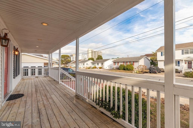 wooden terrace featuring a porch