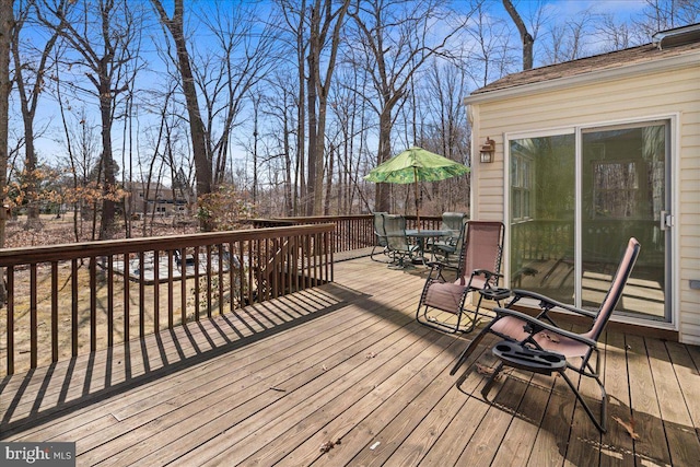 deck featuring outdoor dining space