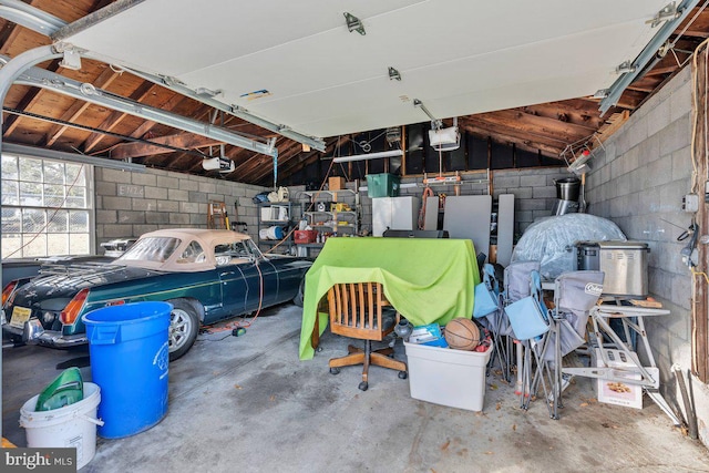 garage featuring a garage door opener