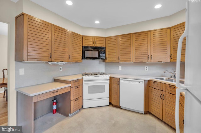 kitchen featuring tasteful backsplash, sink, and white appliances