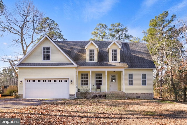 new england style home with a porch and a garage