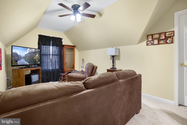 cinema with light colored carpet, vaulted ceiling, and ceiling fan