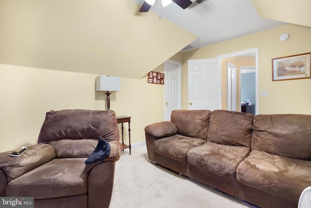 living room featuring carpet flooring and ceiling fan