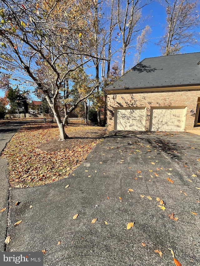 view of home's exterior featuring a garage