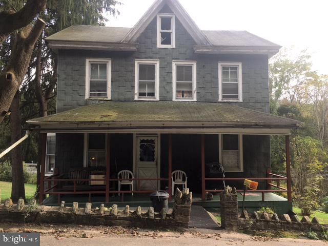 view of front of home featuring covered porch